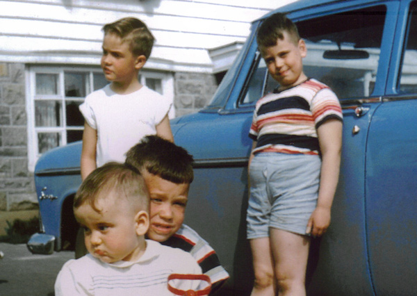 Photo of Brian Stuart, Peter Buchanan, and two other Buchanan kids