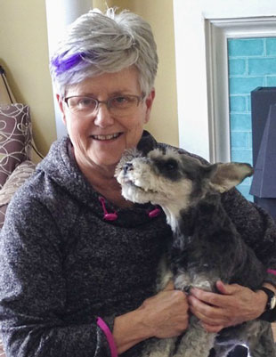 Photo of Linda Fuller Grace holding Heidi