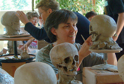 Photo of Veronica Hess sculpting clay